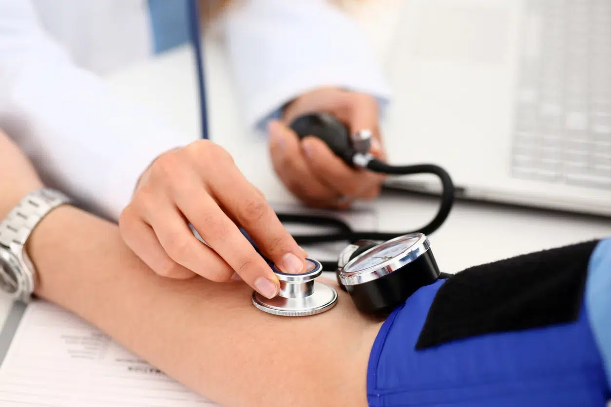 Patient having their BP checked as a primary care service at an integrative addiction treatment program Sarasota FL